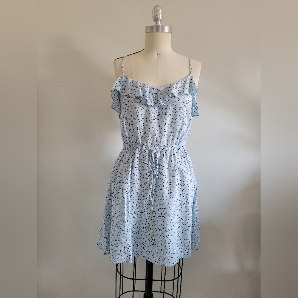 Lightweight blue dress with white flower print and ruffle